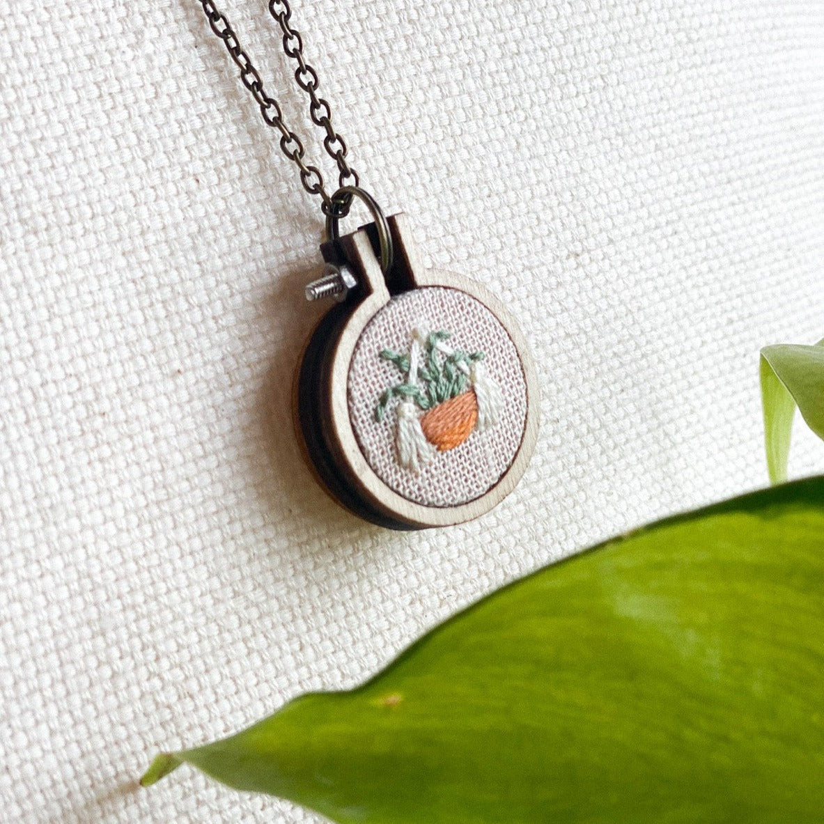 Round Plant Hanger Necklace by Brittany Montour