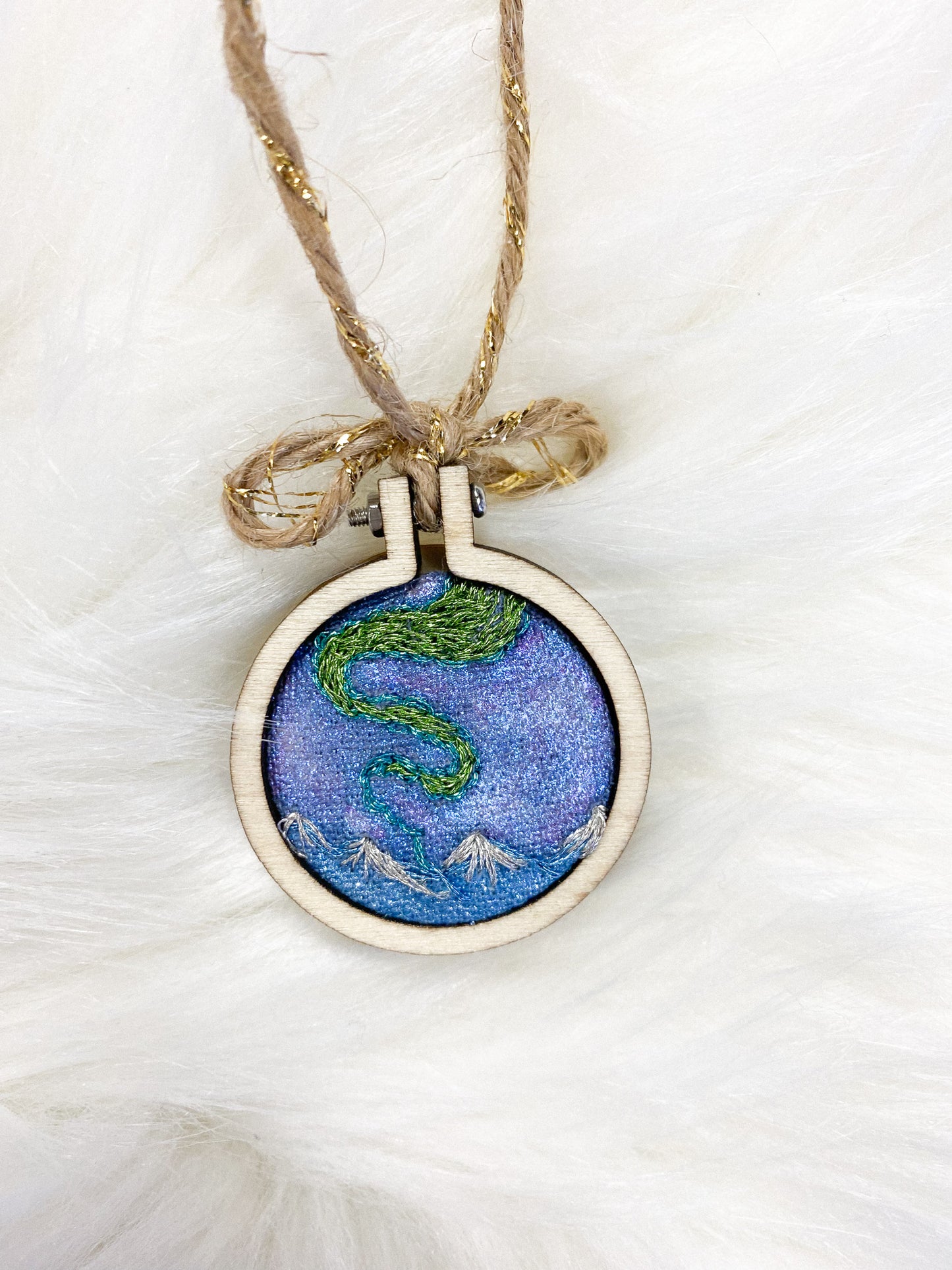 Aurora in the Mountains Embroidered Ornament by Brittany Montour