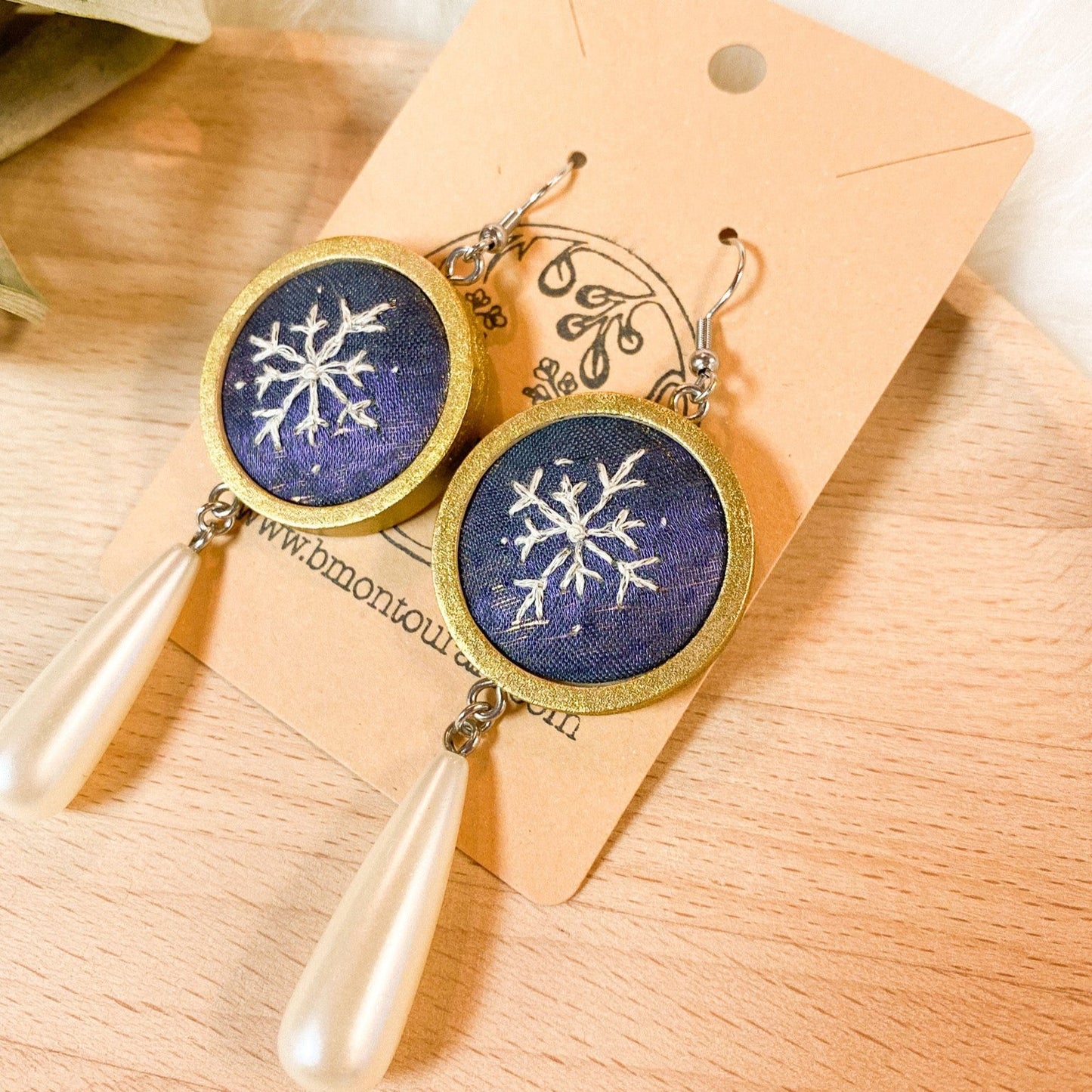 Snowflake Dewdrop Earrings by Brittany Montour