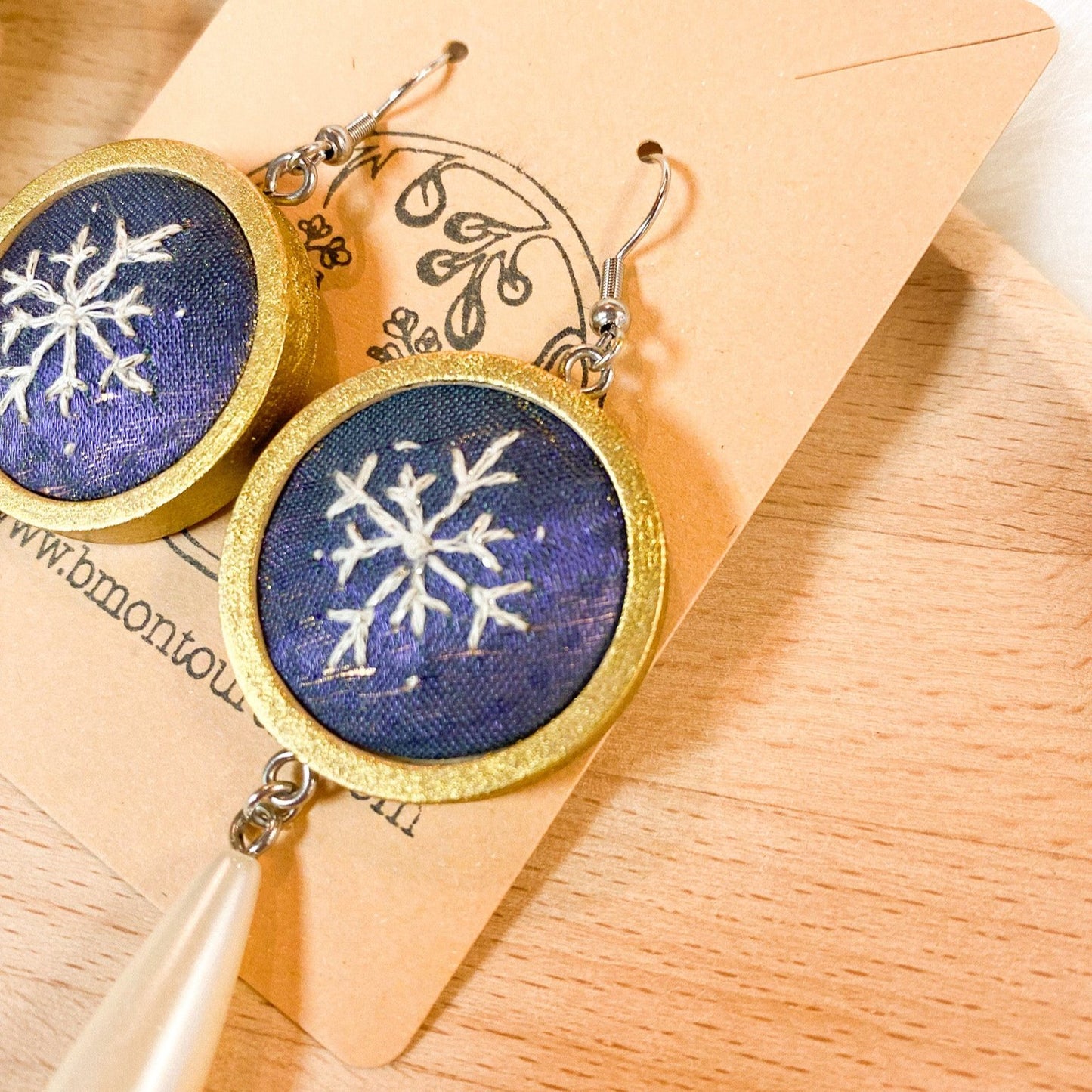 Snowflake Dewdrop Earrings by Brittany Montour