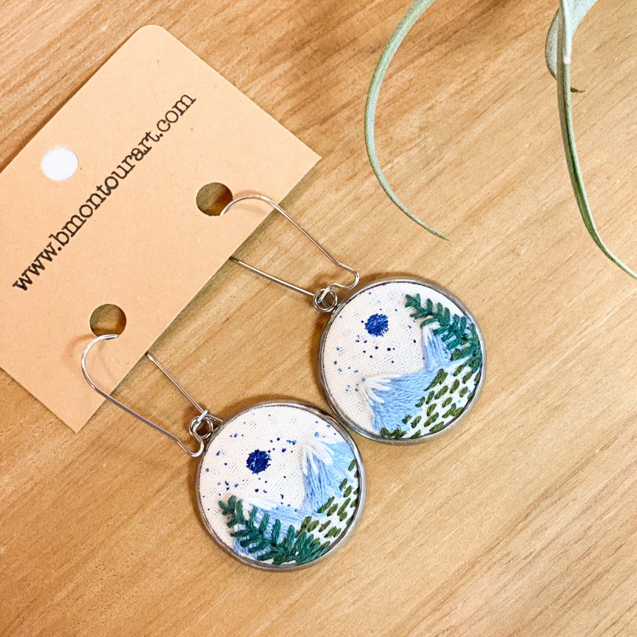 Snowcaps with Moon and Sun Earrings by Brittany Montour