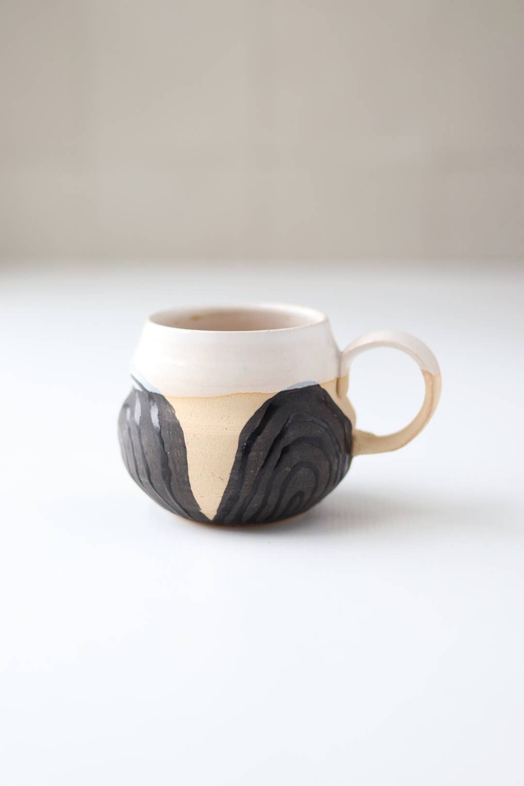 Transformation Mug by Gravesco Pottery
