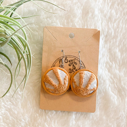 Sun Rays Earrings by Brittany Montour