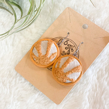 Sun Rays Earrings by Brittany Montour