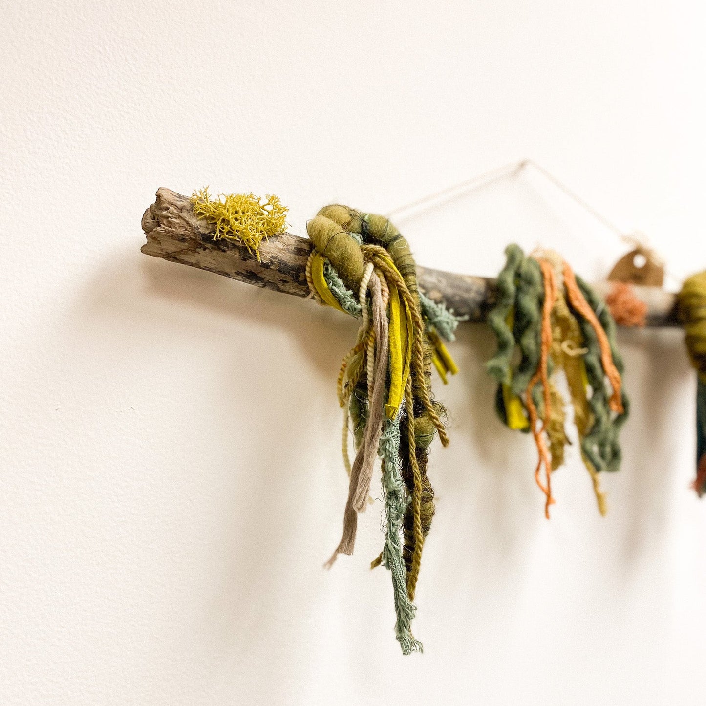 Decorative garland made of natural materials on a white background