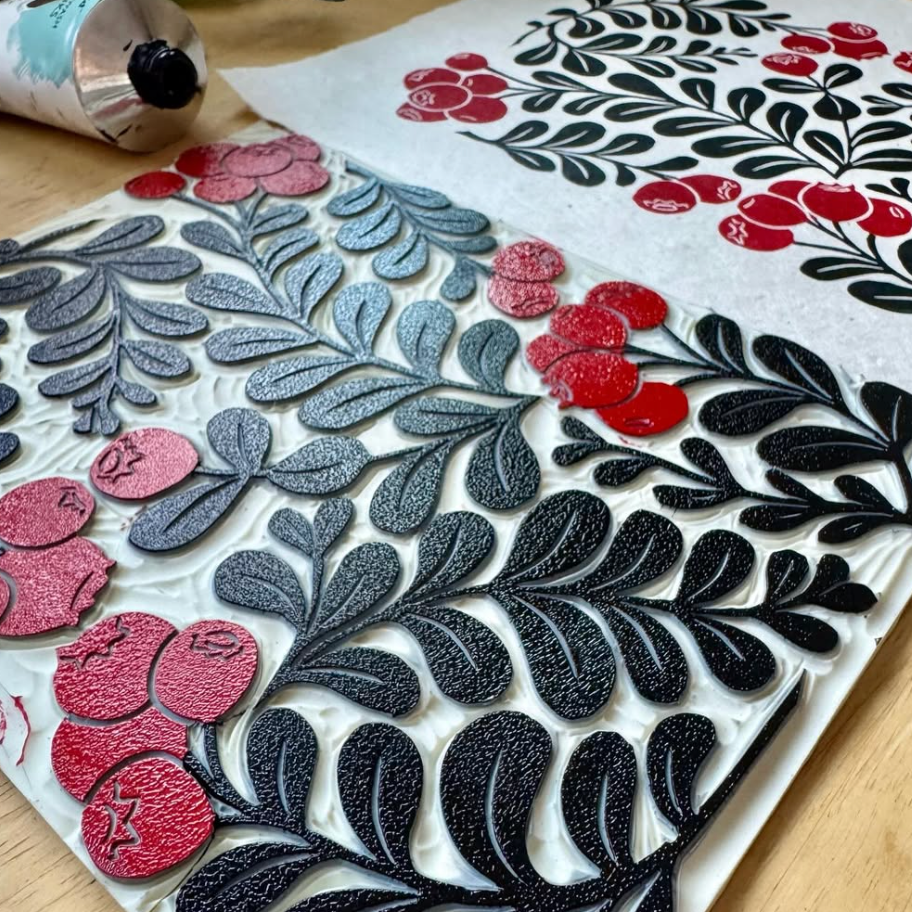 Decorative paper with floral patterns on a wooden surface