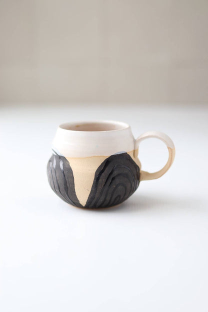 Transformation Mug by Gravesco Pottery